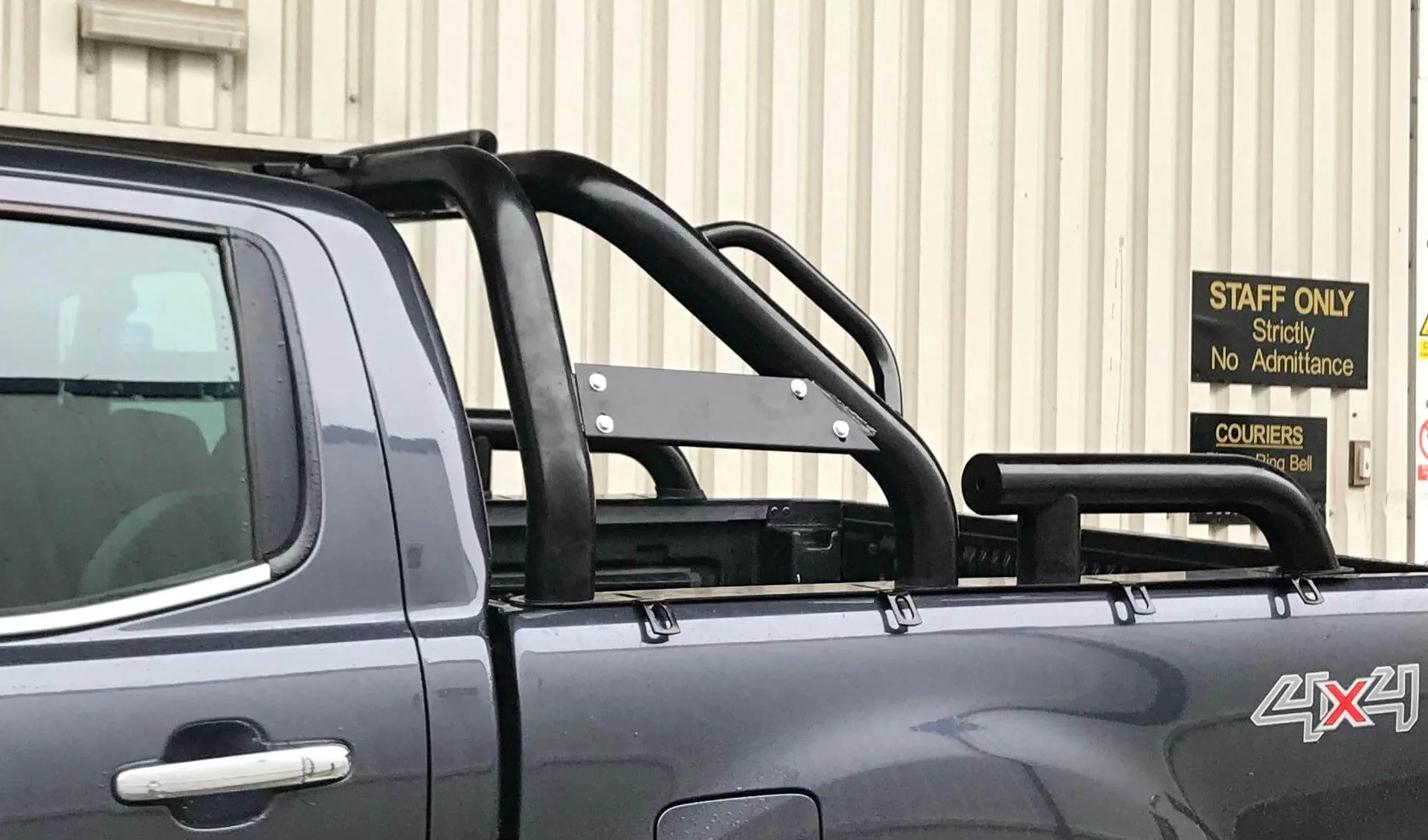 Black SUS201 Long Arm Roll Sports Bar with Grab Handle for the Ford Ranger 06-12