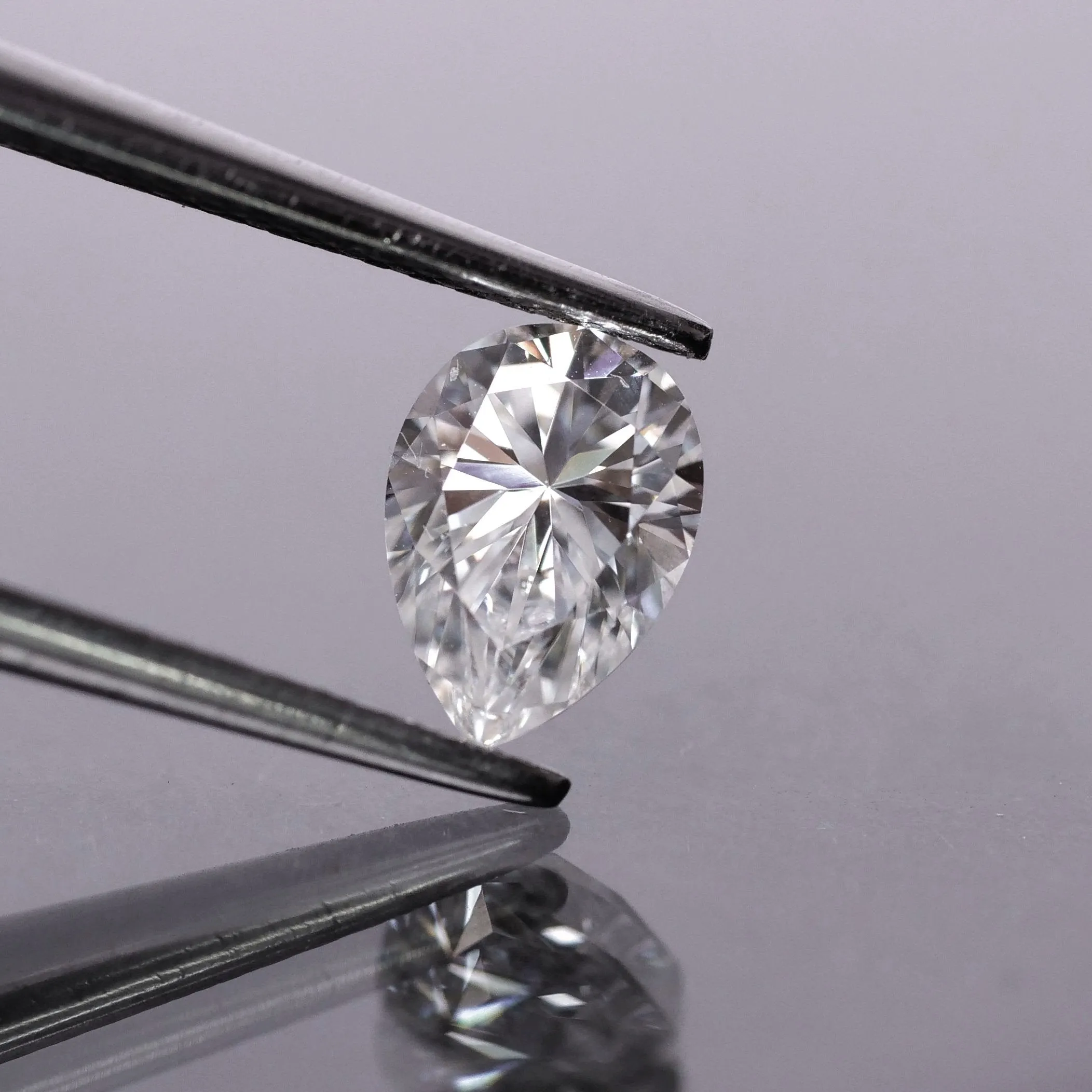 Moissanite | pear cut 7x5 mm, G color, VS, 0.68 ct