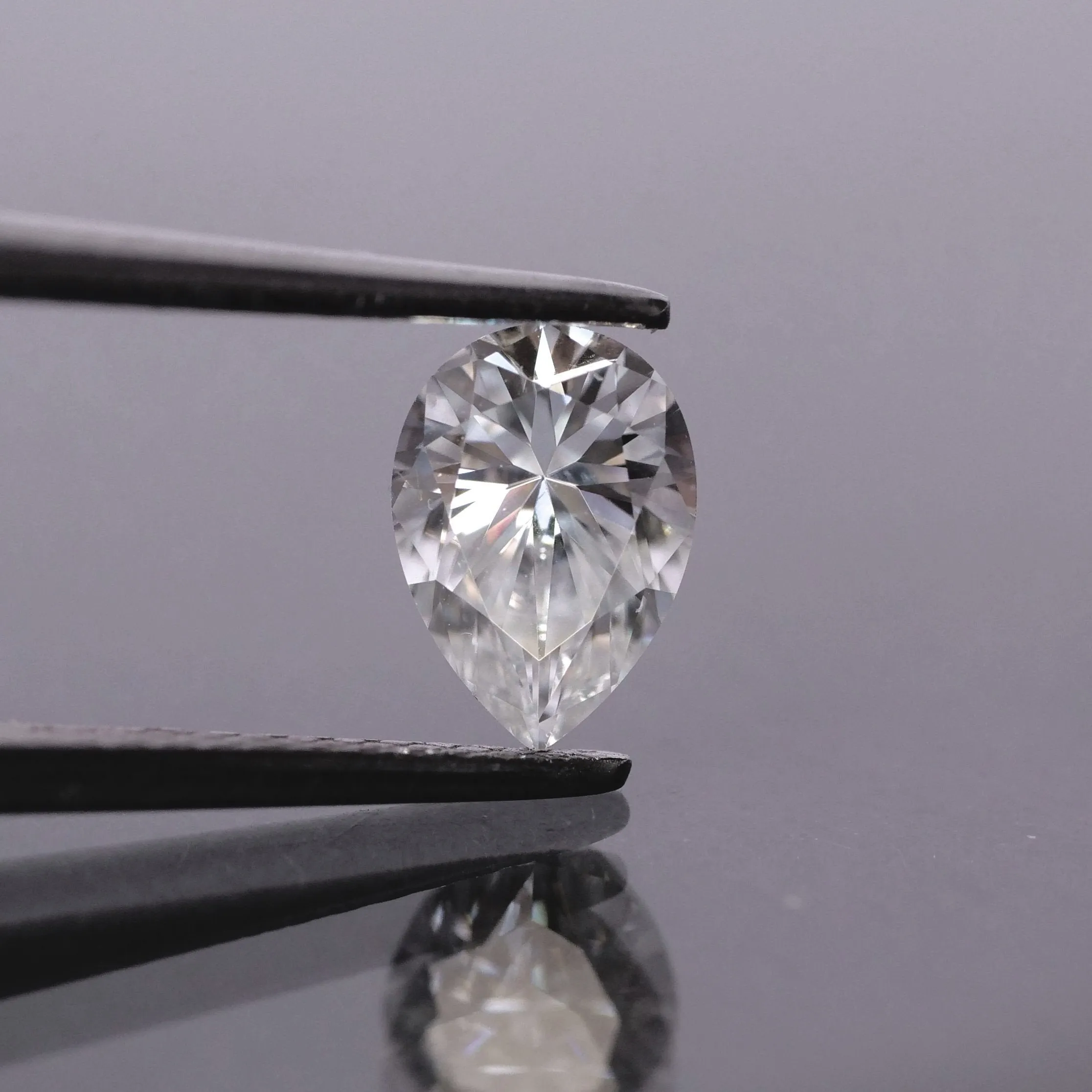 Moissanite | pear cut 7x5 mm, G color, VS, 0.68 ct