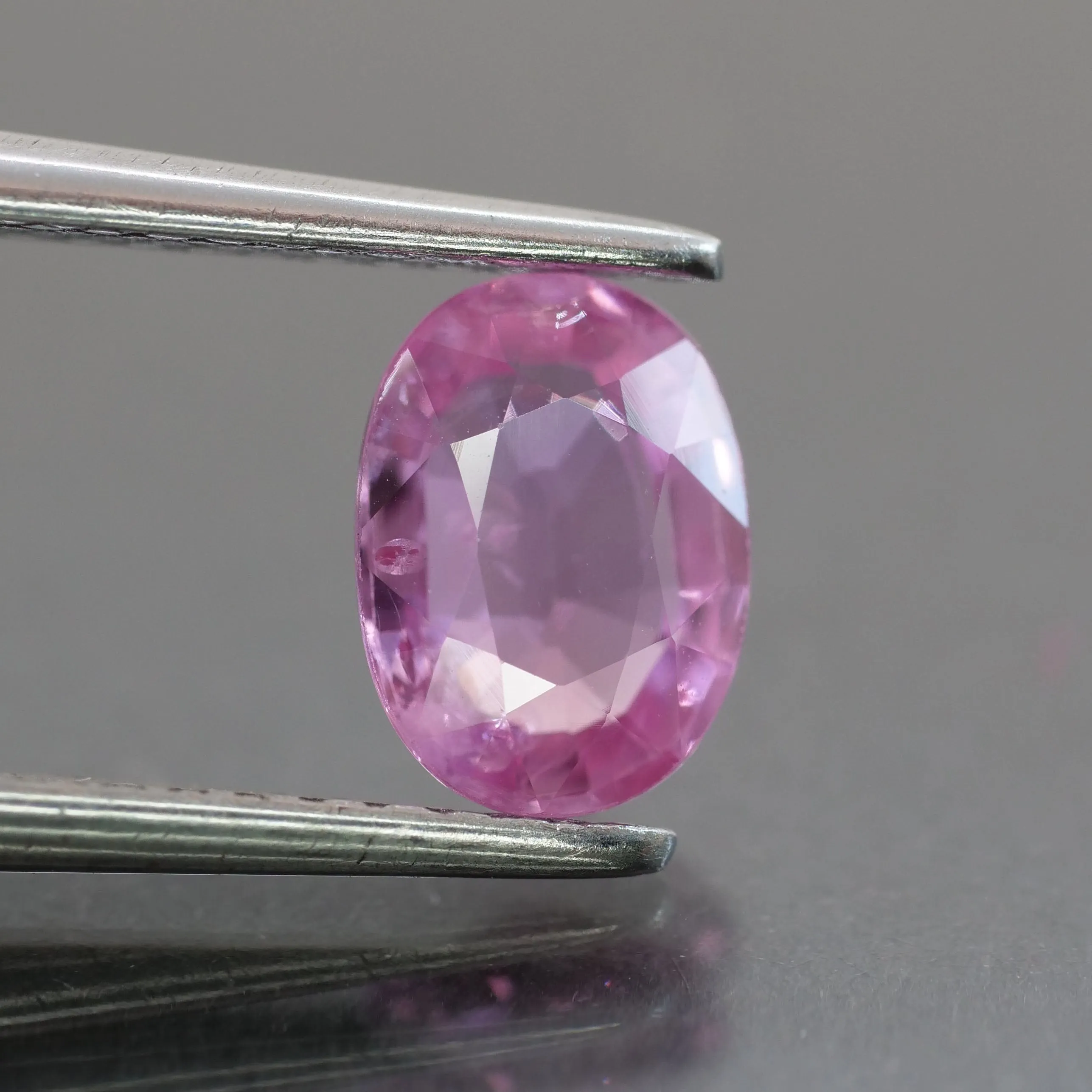 Sapphire | natural, pink, oval cut 7x5 mm, 1.08ct, Mozambique