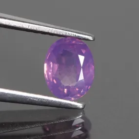 Sapphire opalescent | natural, pinkish purple, oval cut 6.4x5mm, VS 0.87ct