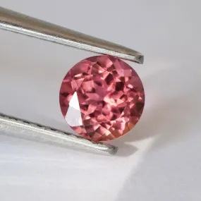 Tourmaline | orangish pink, round cut 5mm, VVS 0.6ct, Africa